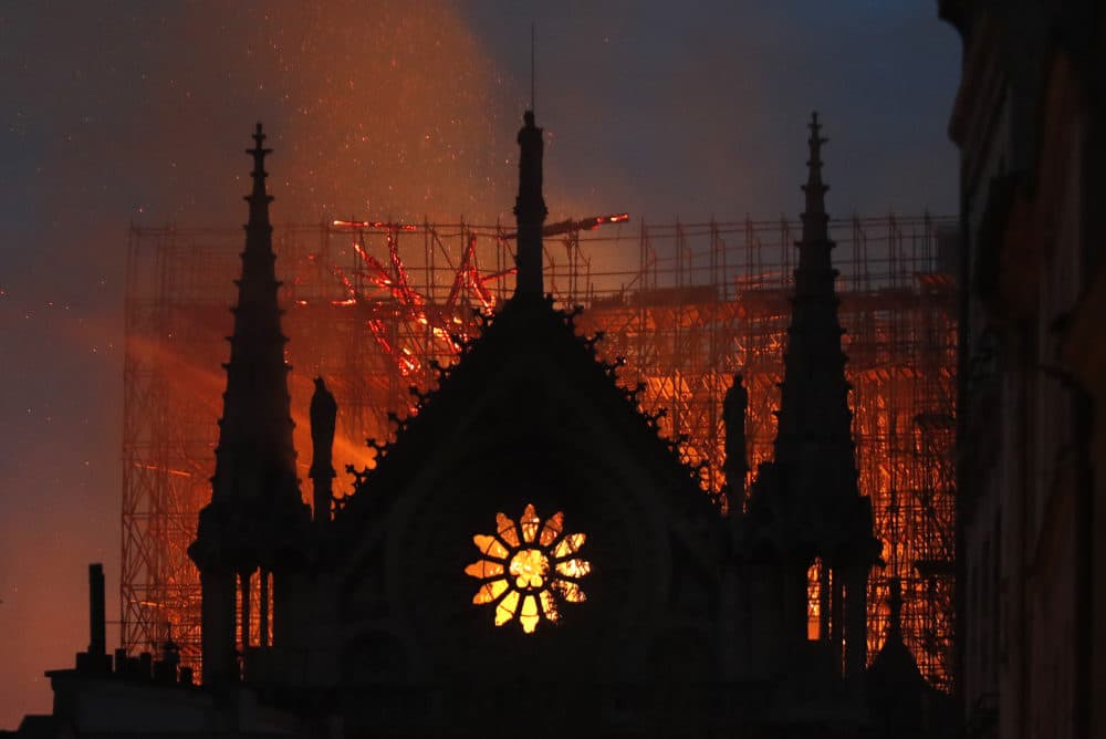 Tiny bomb half past seven Massive Fire At Paris' Notre Dame Cathedral Causes Roof Collapse | On Point
