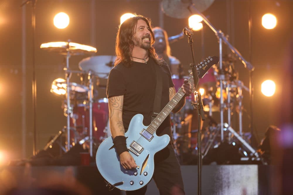 Dave Grohl explains how music — and a hitchhiker wearing a Kurt Cobain t- shirt — helped him heal Here and photo image