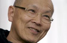 Filmmaker Wayne Wang looks on during an interview in Hong Kong in March 2008. (AP)