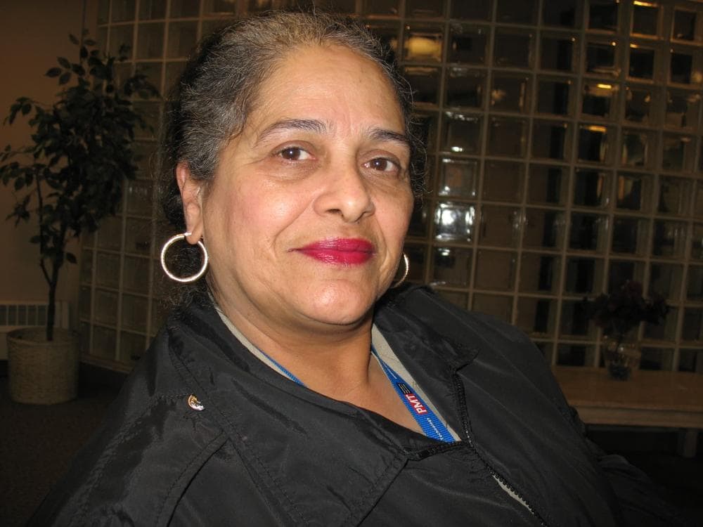 Donna Monterio works full time as a security guard, but can't afford to pay for rent and food. (Monica Brady-Myerov/WBUR)