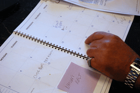 Bates marked the moment on his desk calendar. Monday, May 4: Plant closed. Thursday, May 7: Plant Open. (Meghna Chakrabarti/WBUR)