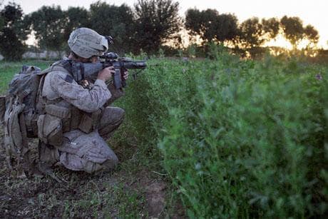 U.S. Marines from the 2nd Marine Expeditionary Brigade, 1st Battalion 5th Marines patrol early Friday morning in the Nawa district in Afghanistan's Helmand province. (AP Photo)