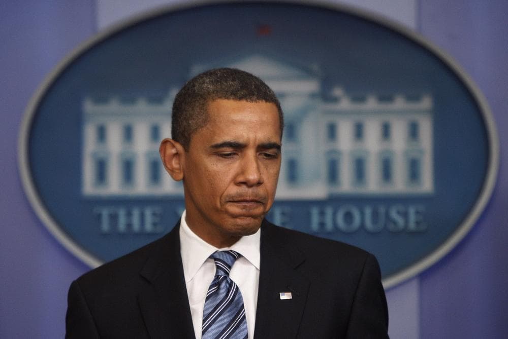 President Barack Obama pauses as he speaks about the incident with Henry Louis Gates Jr. and Cambridge, Mass. police officer James Crowley, Friday, July 24, 2009, in the White House pressroom in Washington.  (AP Photo/Ron Edmonds)