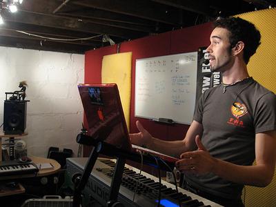 Matthew Ebel performs live in his basement. (Andrea Shea/WBUR)