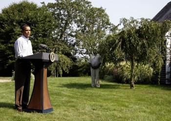 President Obama reads a statement about the death of Sen. Edward Kennedy on Wednesday while on vacation on Martha's Vineyard in Chilmark, Mass. (AP)