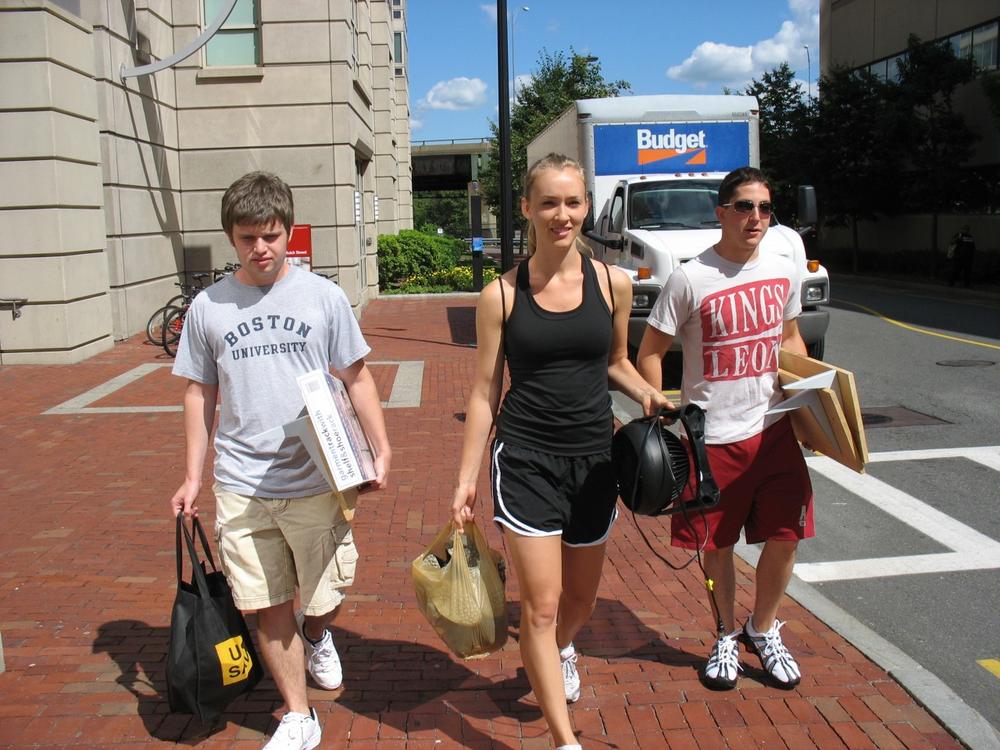 Boston University Seniors Ben Simon, Justin Marble and Erica Masini are moving back to campus with no concern about swine flu.  But area colleges and universities are very worried about a possible outbreak. (Photo by WBUR)