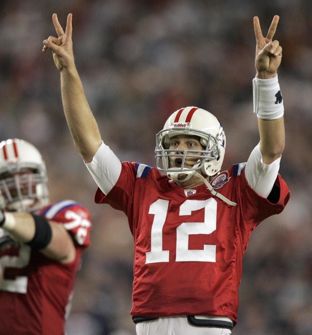 New England Patriots quarterback Tom Brady celebrates the first of two touchdown passes to Benjamin Watson against the Buffalo Bills late in the fourth quarter during an NFL football game on Monday in Foxborough. The Patriots won 25-24. (Steven Senne/AP)