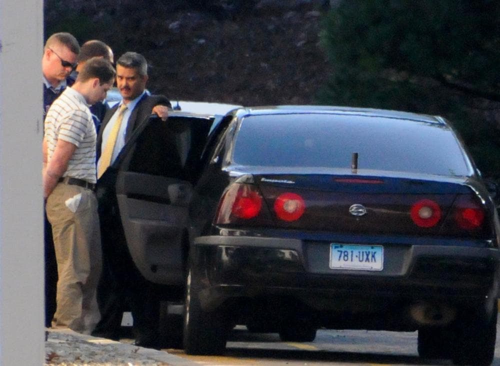 Police officers arrest  Raymond Clark III, left, at a motel in Cromwell, Conn., on Thursday, for the killing of Yale graduate student Annie Le. (AP)