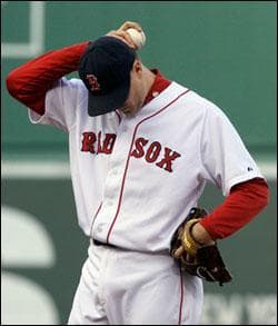 Red Sox closer Jonathan Papelbon waits to be relieved in the ninth inning against the Los Angeles Angels in Boston on Sunday. (Elise Amendola/AP)