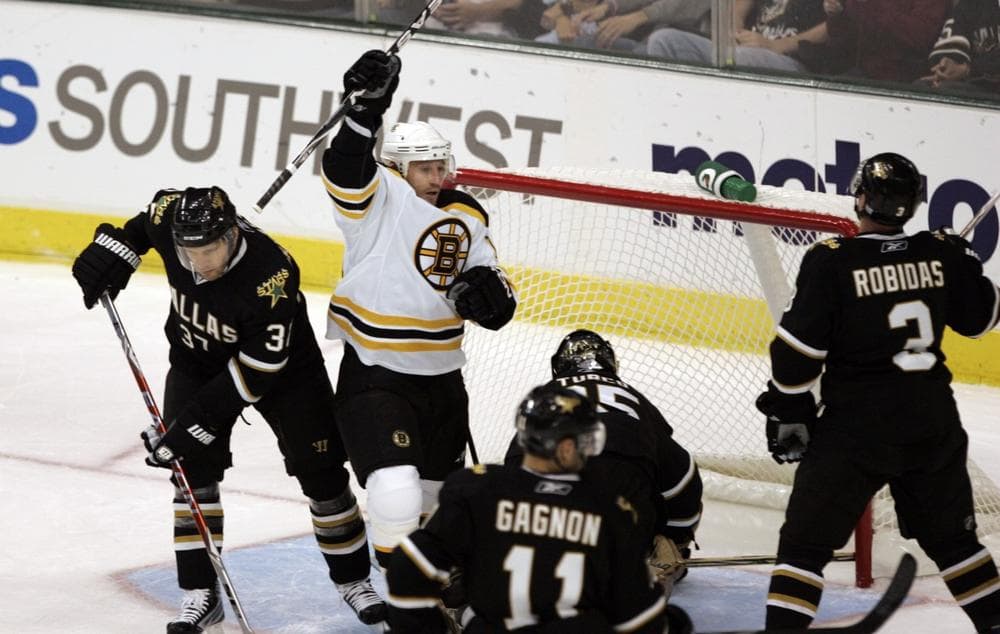 Boston Bruins' Michael Ryder, second from left, celebrates a goal during the first period against the Dallas Stars on Friday, in Dallas. (AP Photo/Mike Fuentes)