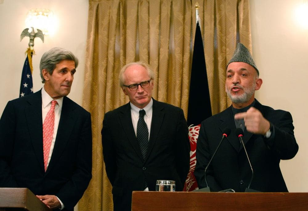 Afghan President Hamid Karzai gestures, right, as Kei Eide head of the United Nations Assistance Mission in Afghanistan, center, and U.S. Sen. John Kerry, D-Mass listen to him during a press conference, in Kabul, Afghanistan on Tuesday. Afghanistan's election commission today ordered a Nov. 7 runoff in the disputed presidential poll after a fraud investigation dropped incumbent Hamid Karzai's votes below 50 percent of the total. Karzai accepted the finding and agreed to a second round vote. (Musadeq Sadeq/AP)