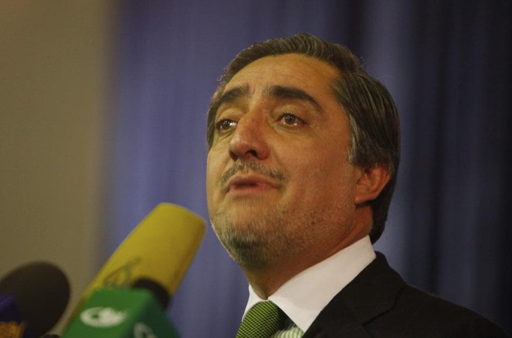 Afghanistan's presidential challenger Abdullah Abdullah announces his decision not to participate in Afghanistan's run-off election during a press conference in Kabul, Afghanistan, Sunday.  (AP /Gemunu Amarasinghe)
