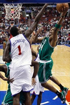 Forward Paul Pierce goes up for a shot as Philadelphia 76ers center Samuel Dalembert defends in the second half of the game on Tuesday. (Matt Slocum/AP)