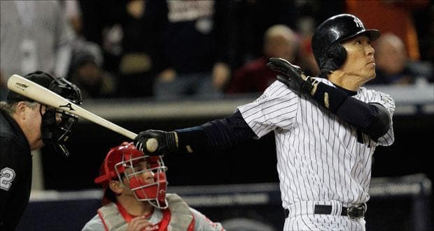 Hideki Matsui watches his two run RBI double during the fifth inning of Game 6 of the World Series on Wednesday. (David J. Phillip/AP)