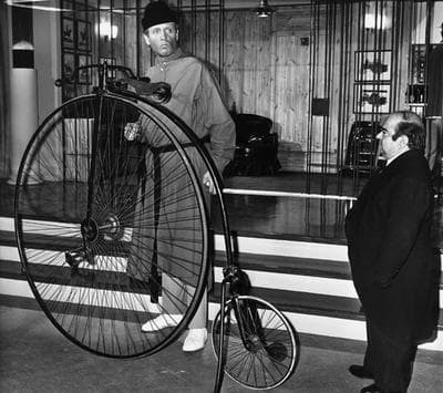 British actor Patrick McGoohan, left, star of the British television series "The Prisoner" is seen with actor Angelo Muscat during a preview of the first episode at M.G.M. Studios, Boreham Wood, England, Sept. 20, 1967. (AP)