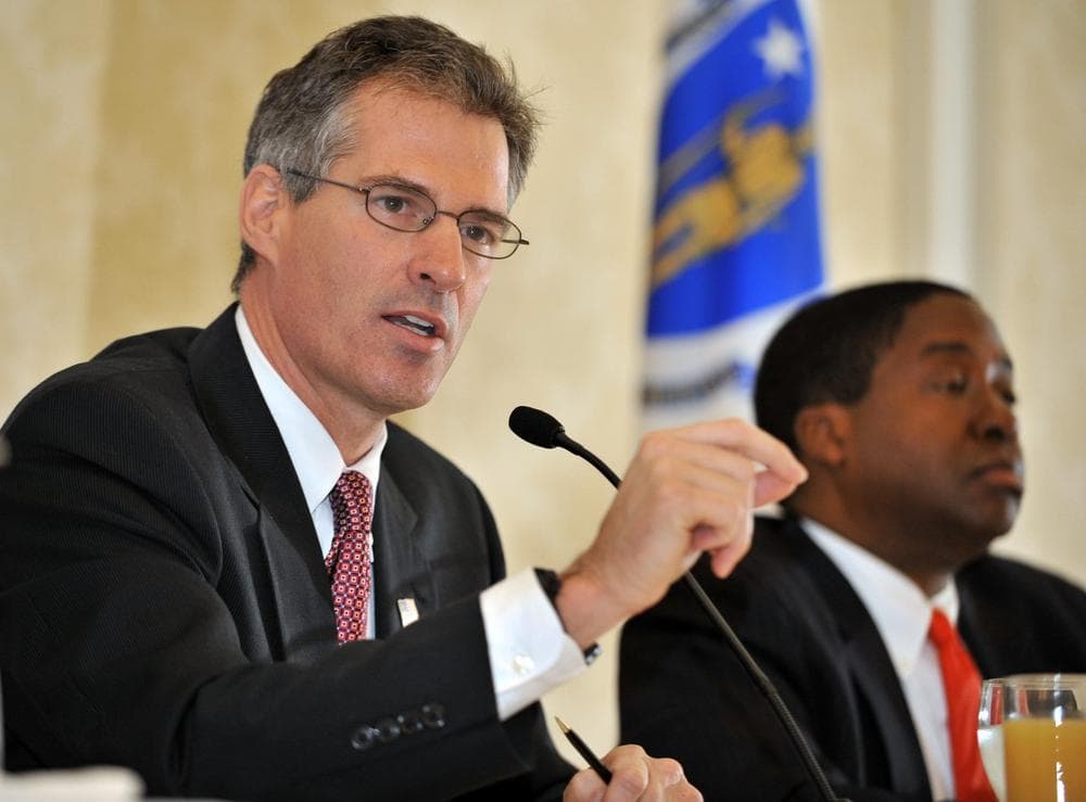 Republican Senate candidate state Sen. Scott Brown, left, speaks during a debate sponsored by the Greater Boston Chamber of Commerce on Monday as businessman and attorney Jack E. Robinson listens on. (AP)