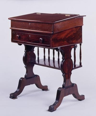 Kennedy used this mahogany desk for most of his 47 years in the back row of the Senate chamber. He remained in the last row even though he'd long ago earned enough seniority to move to the front row. (U.S. Senate Collection)