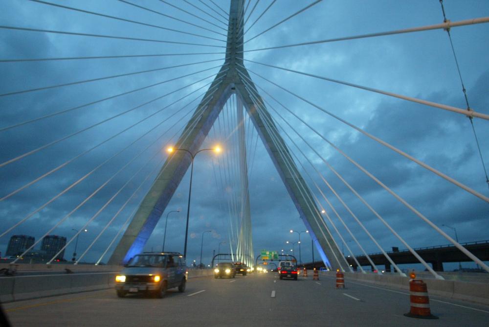 The Massachusetts Department of Transportation will affix red lenses on the lamps illuminating the Zakim Bridge in Boston to mark the 2009 World AIDS Day. (AP)