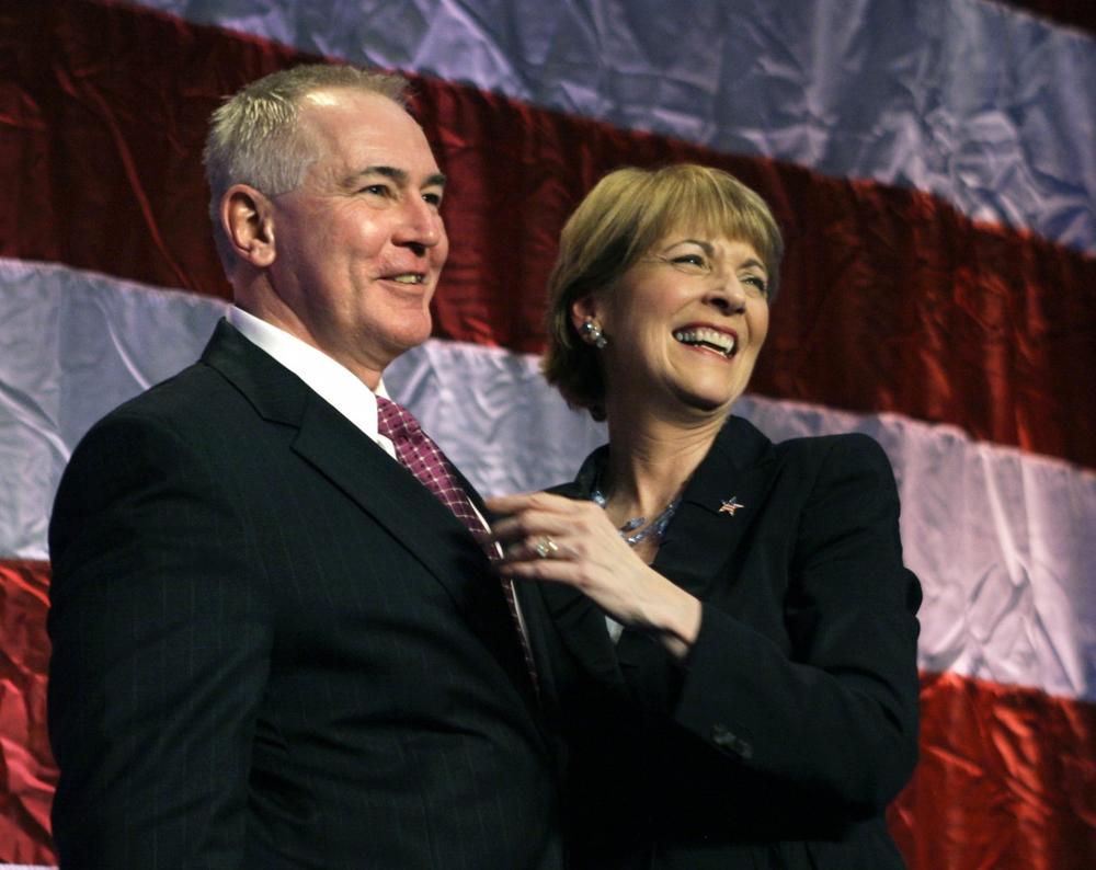 Coakley celebrates with her husband, Thomas F. O'Connor, Jr. (AP)