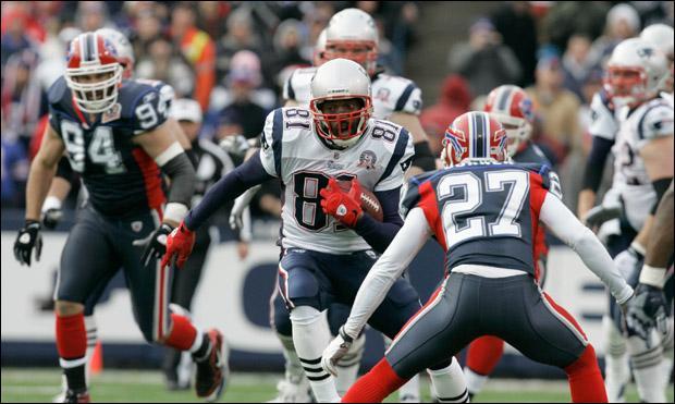 New England Patriots' Randy Moss (81) runs against the Buffalo Bills during the first half of the NFL football game in Orchard Park, N.Y., on Sunday. (AP)