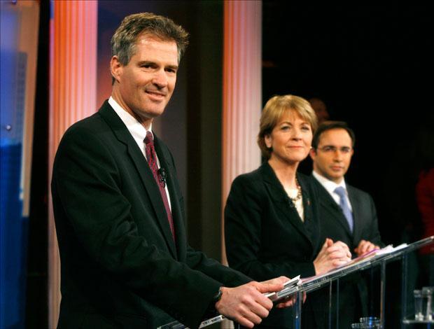 Republican Scott Brown, Democrat Martha Coakley and Libertarian Joseph Kennedy make last minute preparations before a debate at the WBZ-TV studios on Tuesday. (Steven Senne/AP)