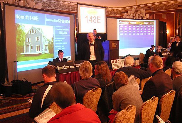 Participants prepare to bid at a recent foreclosure auction at the Boston Park Plaza Hotel. (Sean Cole/WBUR)