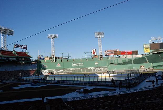Under the looming Green Monster, the newly-constructed ice rink at Fenway Park awaits the NHL's 2010 Winter Classic. (Sarah Bush/WBUR)
