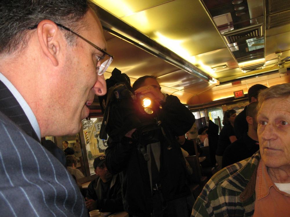 Alan Khazei talking to a customer at Angelo's Orchid Diner, in New Bedford (Photo: Fred Thys)