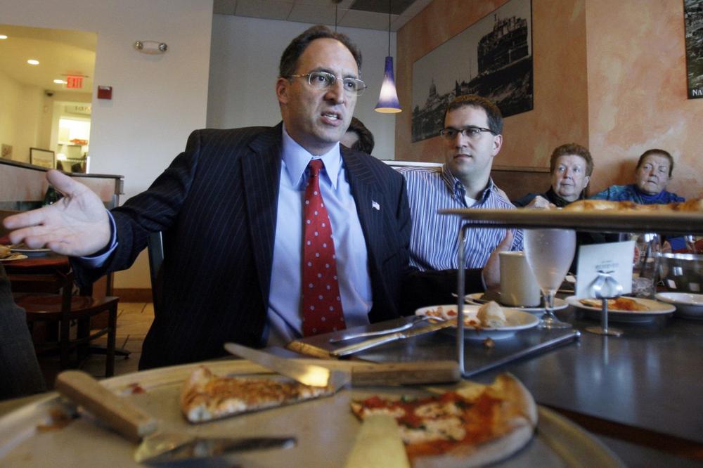 Alan Khazei speaks to diners at Salvatore's restaurant during a campaign stop in Lawrence on Thursday. (AP)