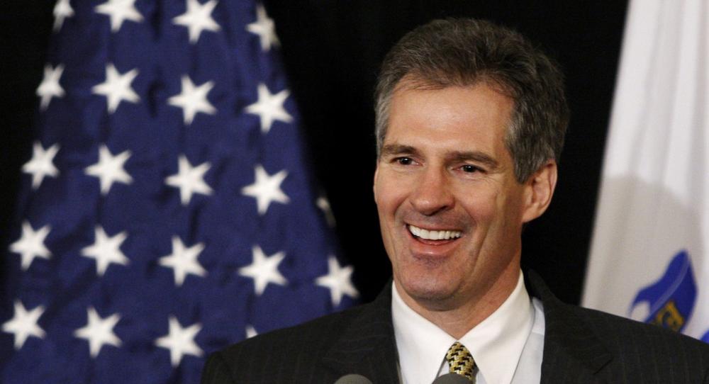 U.S. Sen.-elect Scott Brown smiles as he addresses reporters during a news conference at the Park Plaza Hotel in Boston on Wednesday. (AP)