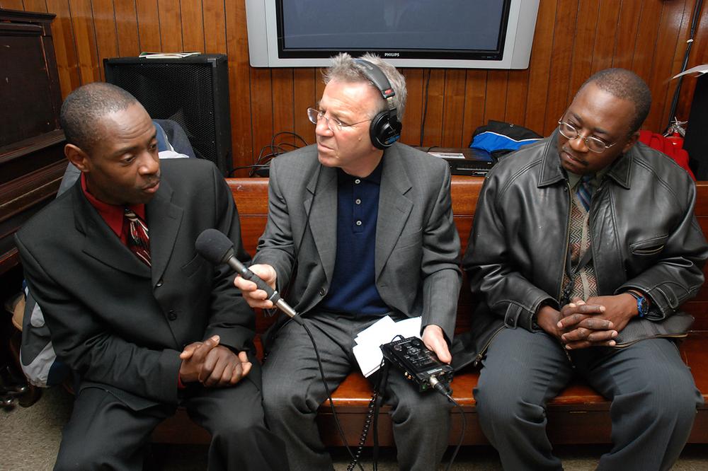 WBUR's David Boeri interviews Jean Claude. (Andrew Phelps/WBUR)