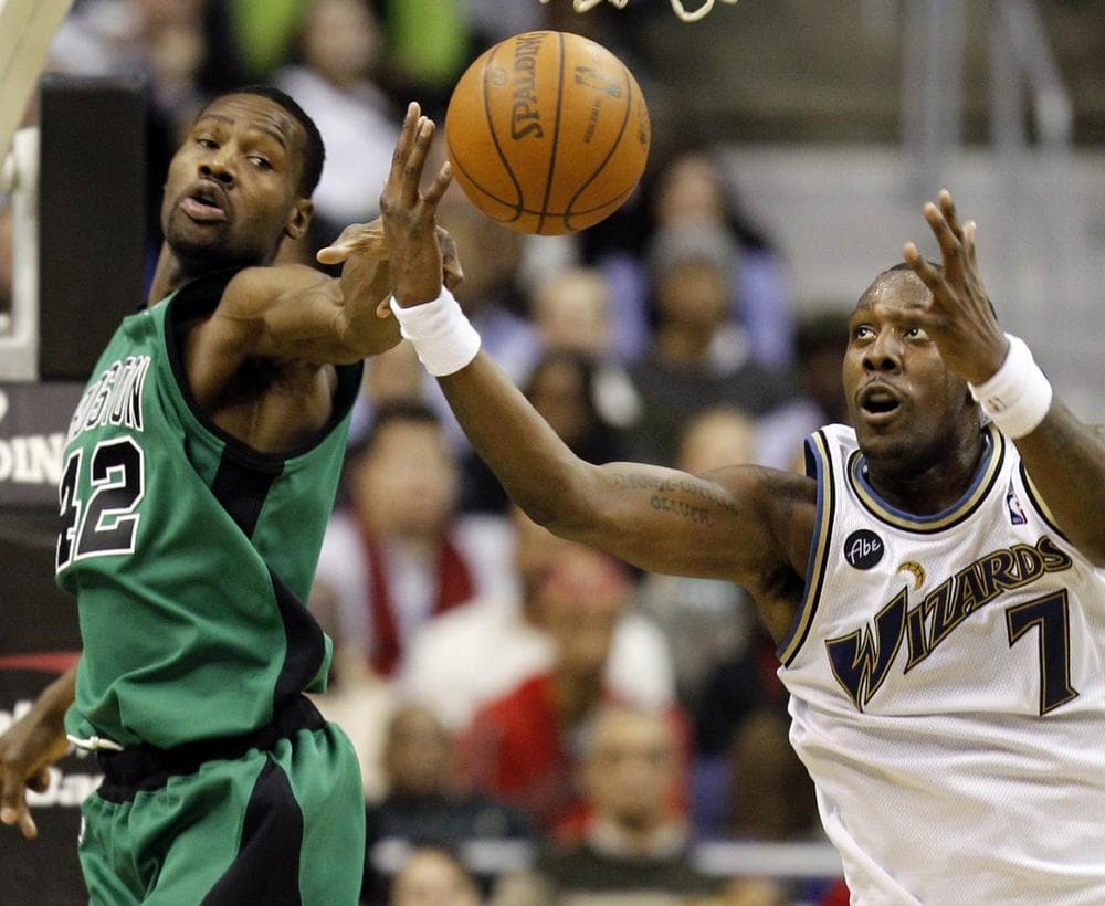 Washington Wizards forward Andray Blatche goes for the ball with Boston Celtics guard Tony Allen in the second half of an NBA basketball game in Washington Monday, Feb. 1, 2010. The Celtics won 99-88.(AP Photo/Alex Brandon)