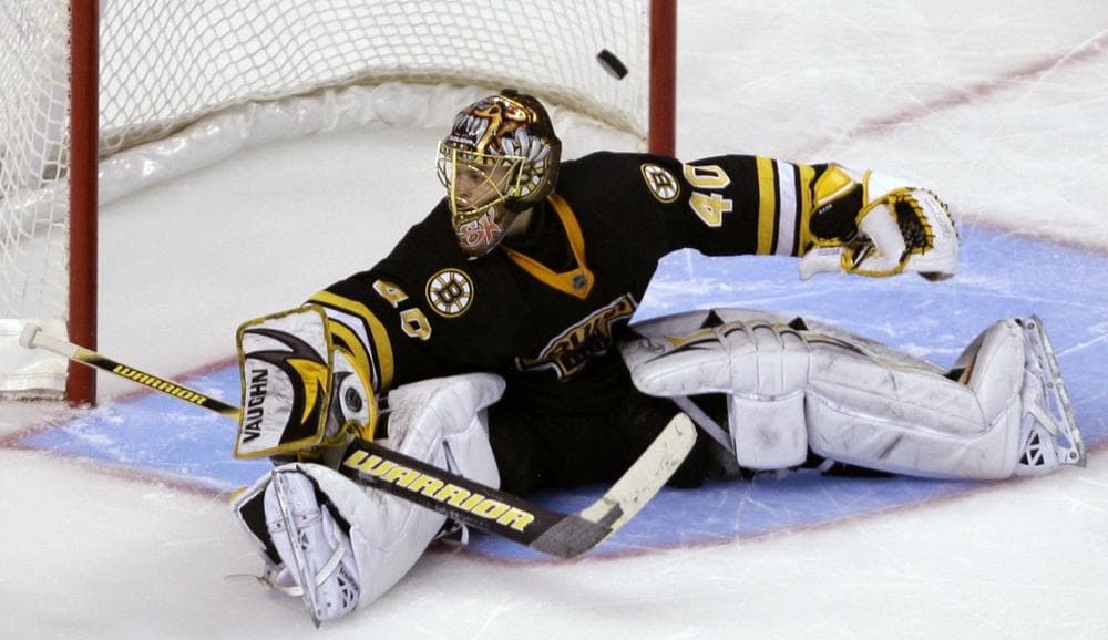 A shootout goal by Montreal Canadiens' Brian Gionta goes over Boston Bruins goalie Tuukka Rask, of Finland, during Thursday's game. (AP Photo/Charles Krupa)