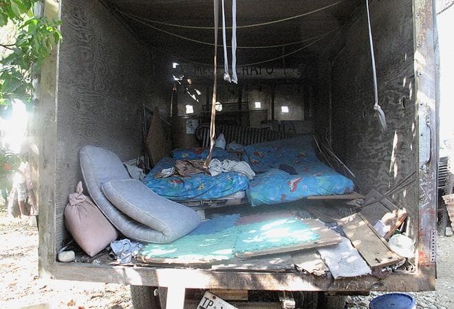 Since the earthquake, Chapo has slept in the trailer of a container truck. (Seth Rolbein for WBUR)