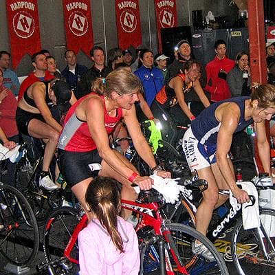 Riders in the elite women’s heat race in the Harpoon Indoor Time Trial at the Harpoon Brewery in South Boston on Jan. 30.  (Doug Tribou/WBUR)