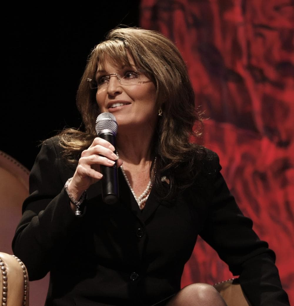 Former vice presidential candidate Sarah Palin addresses attendees at the National Tea Party Convention in Nashville, Saturday. (AP Photo/Ed Reinke)