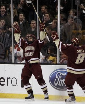 Boston College's Chris Kreider celebrates his goal with teammate Edwin Shea (8) during the second period against Boston University in the championship game of the 58th Beanpot college hockey tournament in Boston. (Winslow Townson/AP)