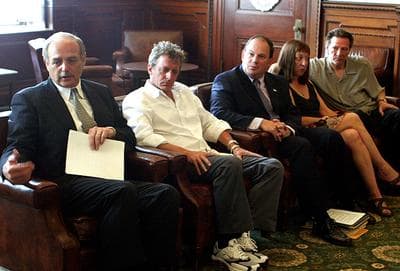 Former Mass. House Speaker Salvatore DiMasi, left, speaks during a meeting about legislation to provide tax incentives to the motion picture industry, with film producer G. Mac Brown; Rep. Thomas O'Brien of Kingston, Marianne Cooper and her husband, actor Chris Cooper, in July 2005 at the State House in Boston. (AP)