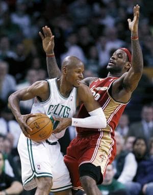 Boston Celtics' Ray Allen looks to move past Cleveland Cavaliers' LeBron James in the fourth quarter of Thursday's game. (AP Photo)