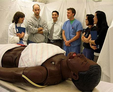 Medical workers at Children's Hospital in Boston participate in a simulation program to prepare them for the environment and injuries they will encounter in treating earthquake victims in Haiti. (Sacha Pfeiffer/Here &amp; Now)