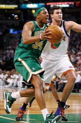 Boston Celtics' Paul Pierce drives to the basket ahead of New York Knicks' Danilo Gallinari during the second half of the game on Wednesday. (Mary Schwalm/AP)