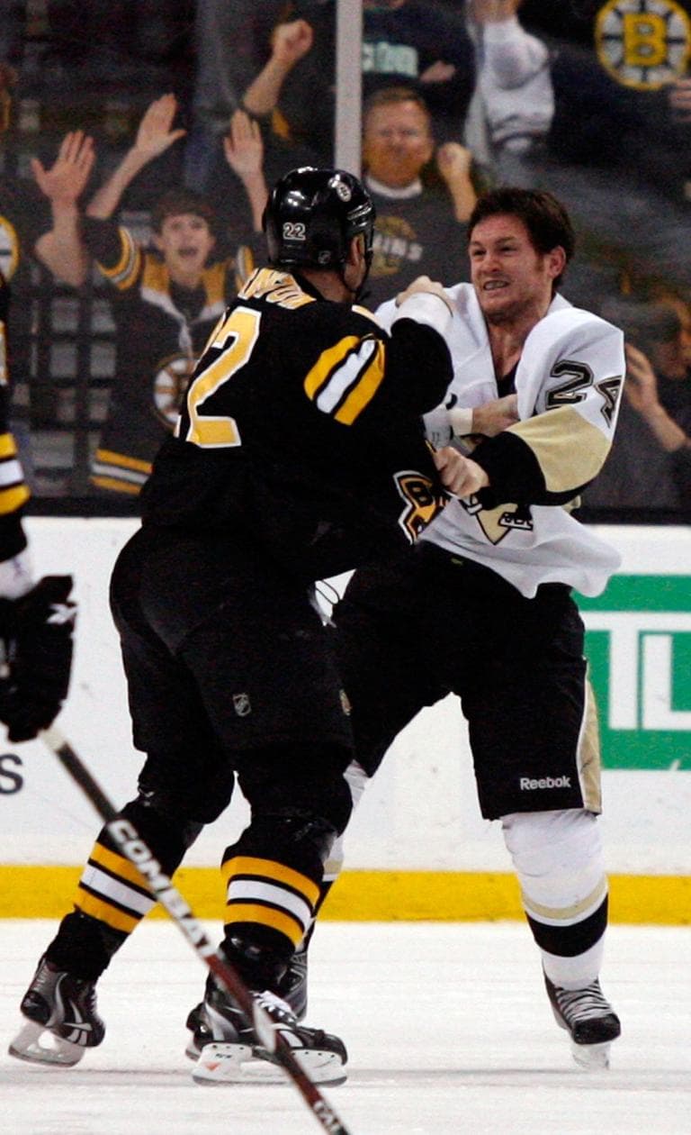 Boston Bruins' Shawn Thornton (22) fights with Pittsburgh Penguins' Matt Cooke (24) early in the the first period of an NHL hockey game on Thursday in Boston. (AP)
