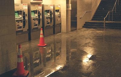 Water collects at the Kenmore T station. (Gabrielle Levy for WBUR)