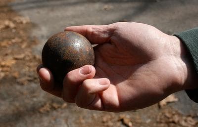 The "bowl" is 28-ounces of solid steel — or about five times as heavy as a cue ball. (Chris Berdik for WBUR)