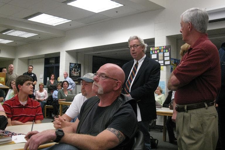 South Hadley parent Darby O'Brien speaks at a school committee meeting in South Hadley Wednesday night. (Deborah Becker/WBUR)