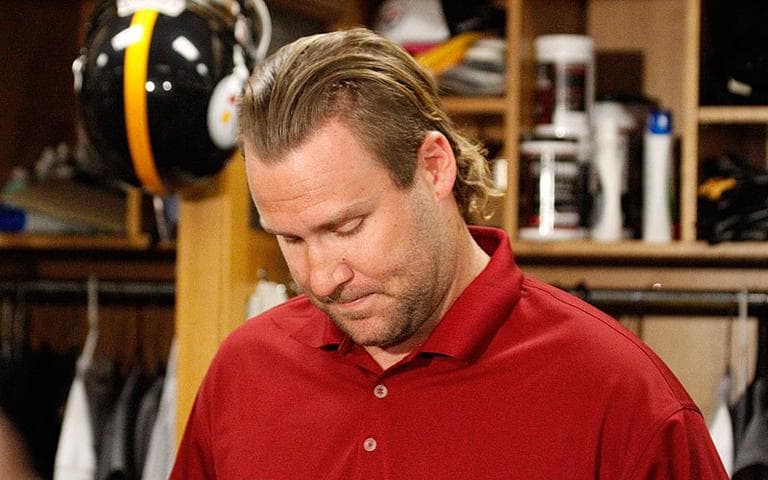 Pittsburgh Steelers quarterback Ben Roethlisberger reads a statement in the team's locker room on Monday. Roethlisberger says he is "happy" to put sexual assault allegations behind him and knows he must work to regain the trust of teammates and fans. (AP)