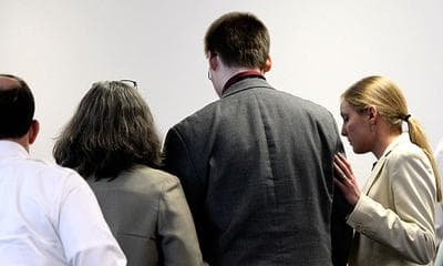 John Odgren, third from left, listens to the jury's verdict in his murder trial at Middlesex Superior Court in Woburn on Thursday. (AP/Pool)