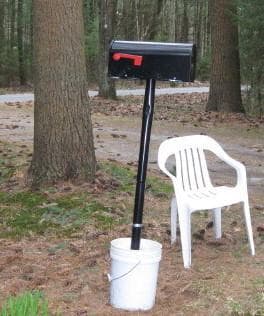 Peg Lorenz wanted to plant her new mailbox the day she closed on her new home.  It's had to wait.  (Curt Nickisch/WBUR)