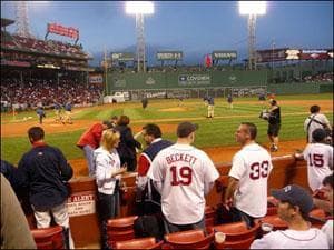 Fans wait ahead of the game. (Sam Fleming/WBUR)