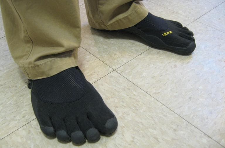 Evan Ferrell's very Paleo shoes &mdash; Vibram Five Fingers (Andrea Shea/WBUR)